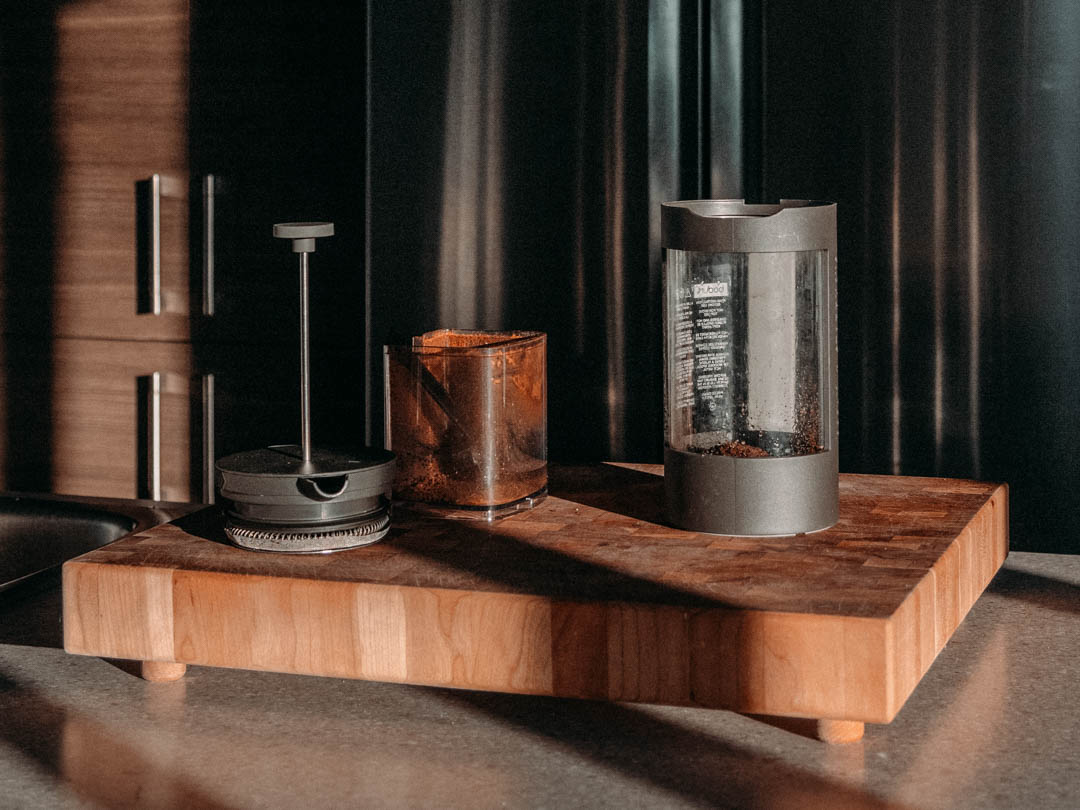 French press coffee maker with freshly ground coffee