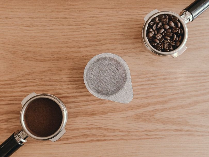 Ground coffee, ESE Coffee Pod, and Whole Coffee Beans Sitting Side-by-side
