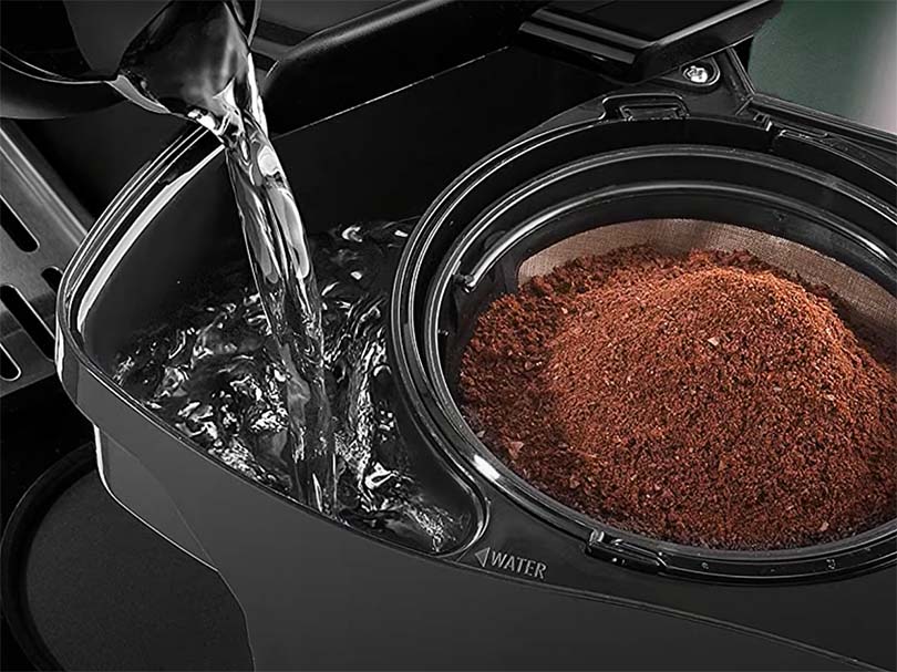 Coffee filter swings out from the front of the DeLonghi All-In-One coffee maker