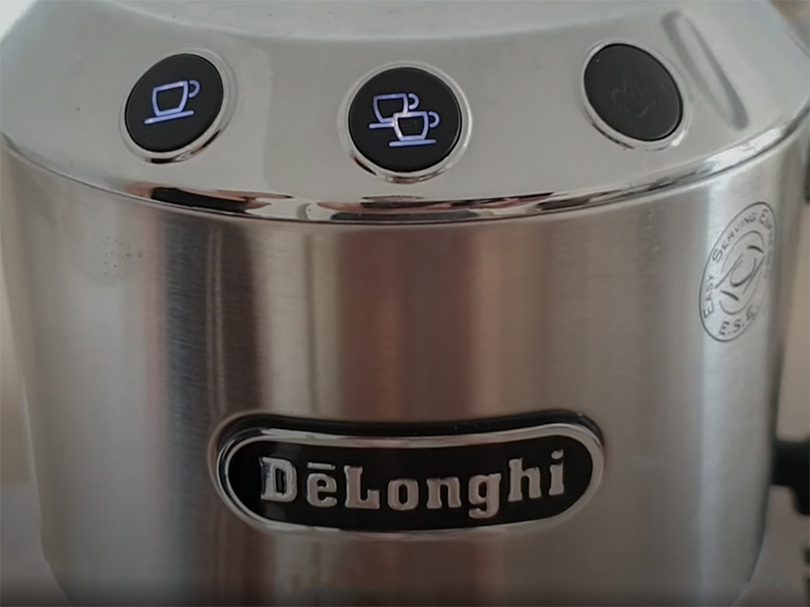 Three buttons on the DeLonghi Dedica Deluxe