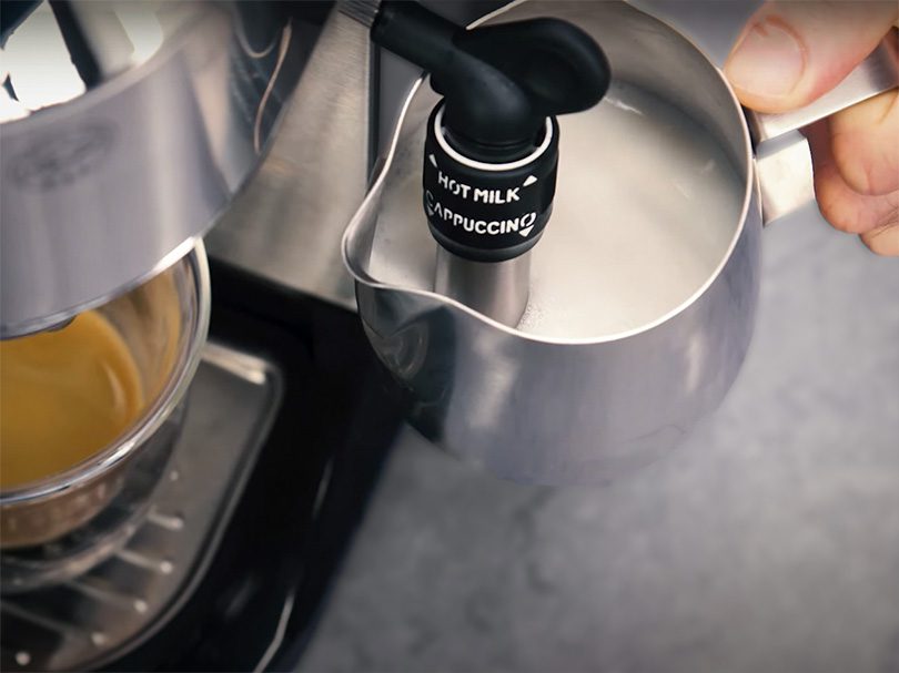 Manually frothing milk on the DeLonghi Dedica Deluxe espresso machine