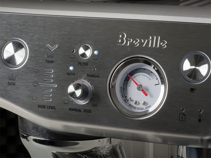 User interface (buttons and gauge) of the Breville Barista Express Impress