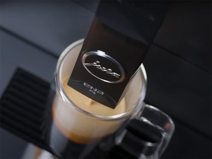 Jura ENA 4, superautomatic espresso machine making an espresso drink
