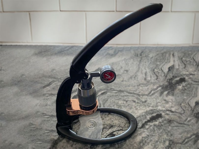 Flair Signature espresso maker sitting on kitchen counter