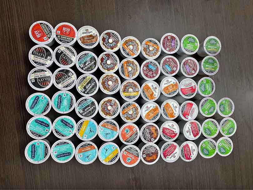 Selection of K Cups sitting on a wooden table