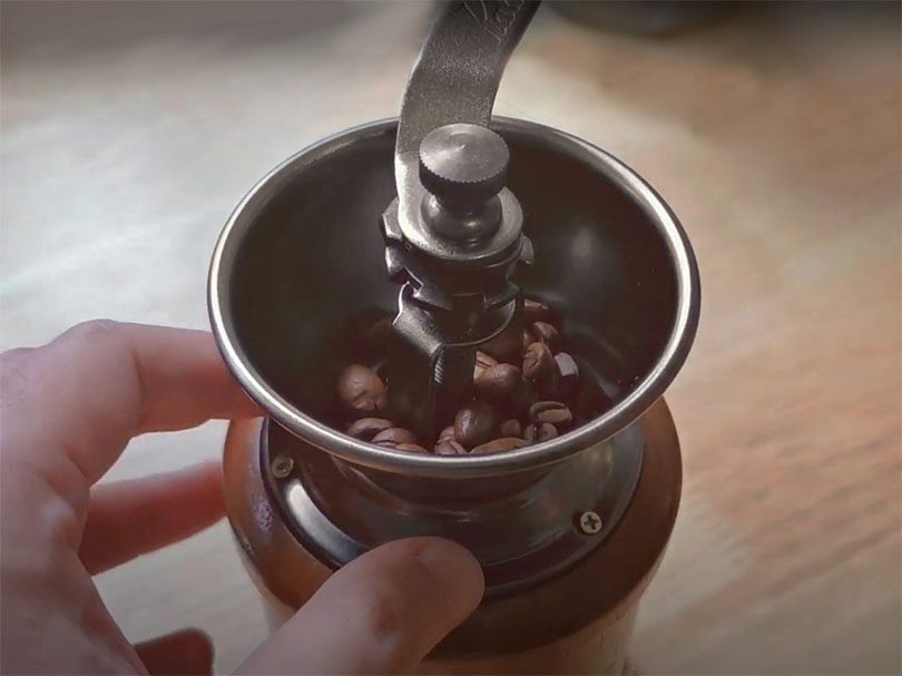 Coffee beans in the hopper of the Kalita KH-3 Retro One coffee grinder