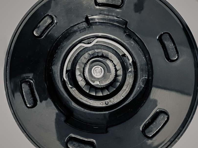 Close up of the 40mm stainless steel conical burr inside the Oxo Brew coffee grinder