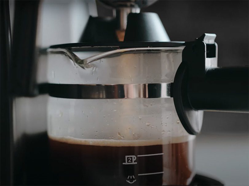Sowtech espresso machine freshly making espresso directly into the coffee carafe