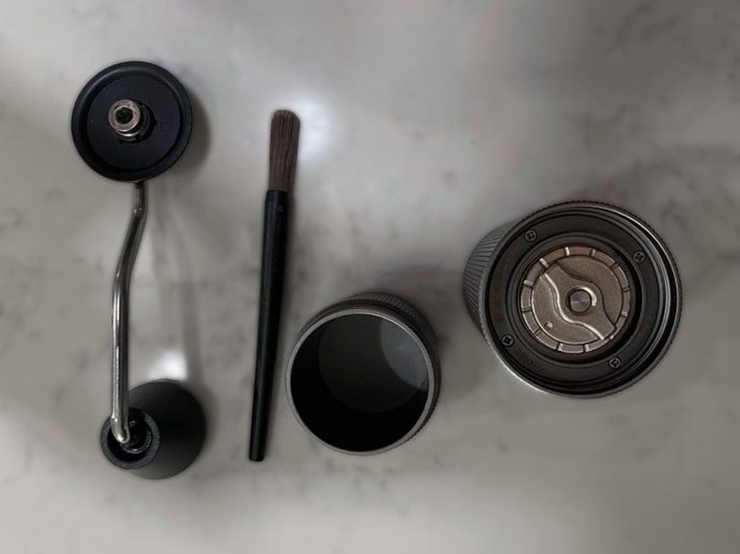 Parts of the Timemore C2 laid out for cleaning