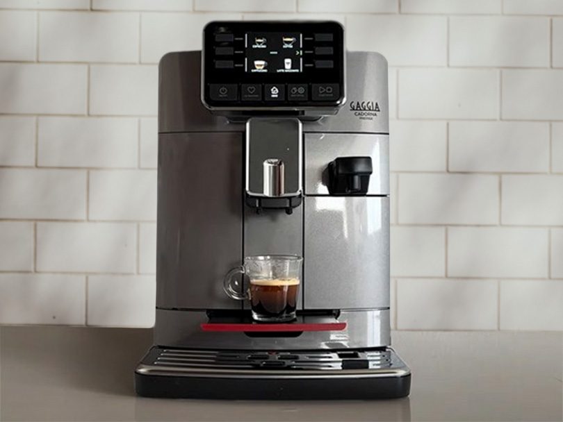 Front view of the Gaggia Cadorna Prestige in front of a tiled wall