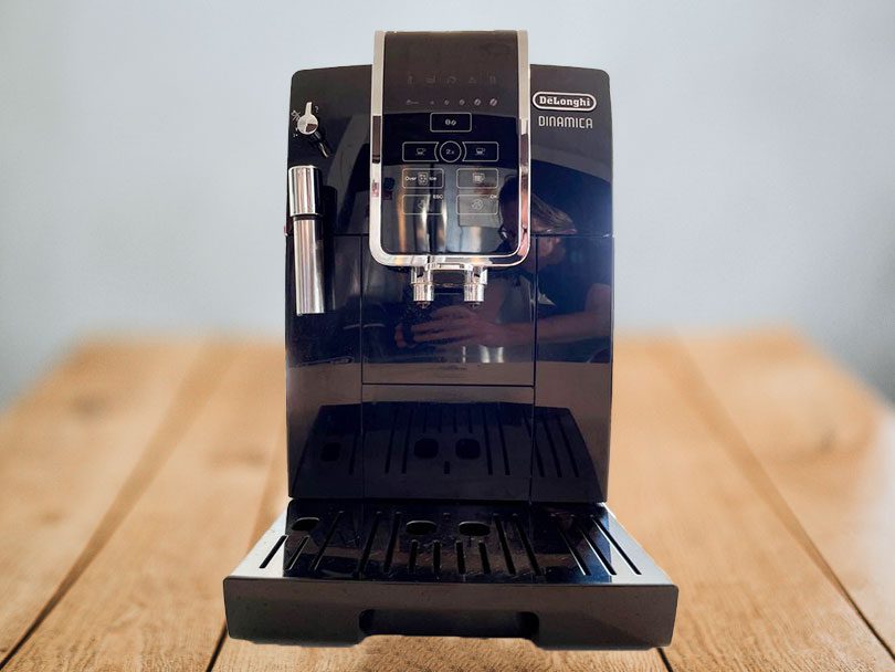 DeLonghi Dinamica espresso machine (no LatteCrema system) on wooden table