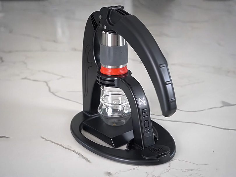Flair Neo Flex with scale and clear espresso cup underneath