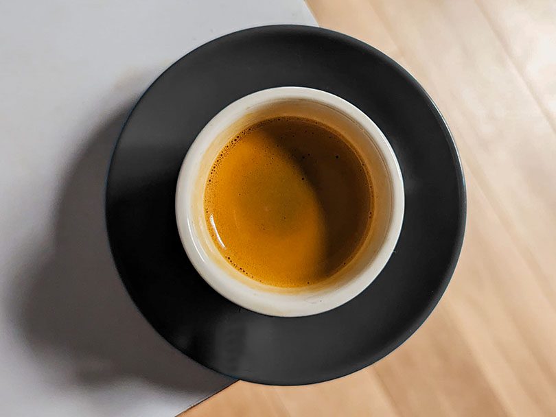 Top-down view of a cup of espresso with crema layer