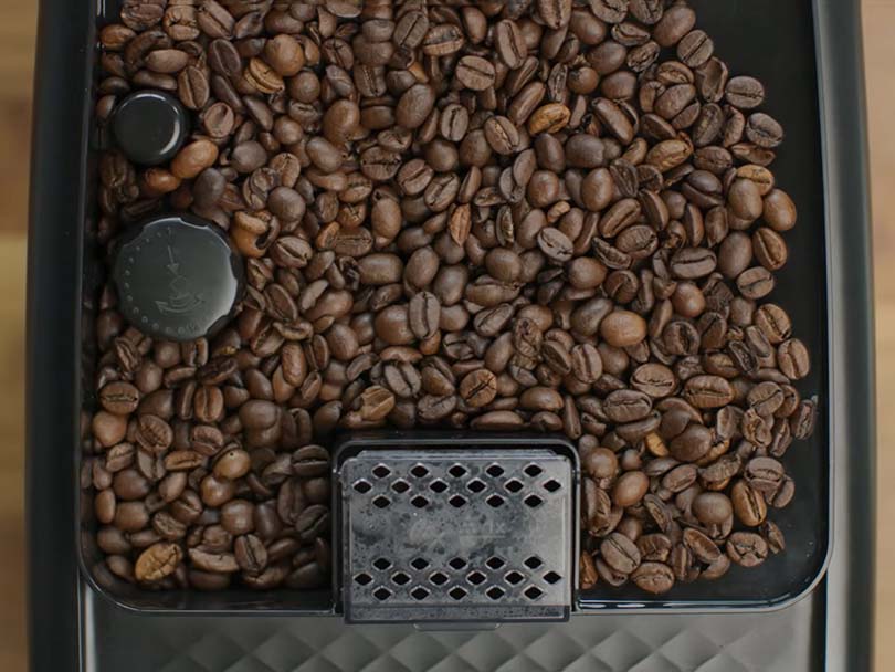 Top-down view of the Philips 3200's bean hopper and grind adjustment dial
