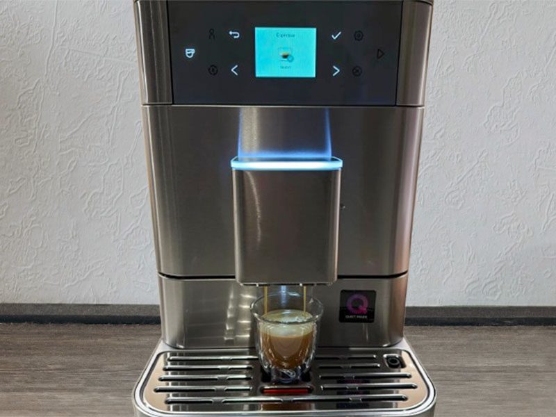 The KitchenAid KF6 making a shot of espresso