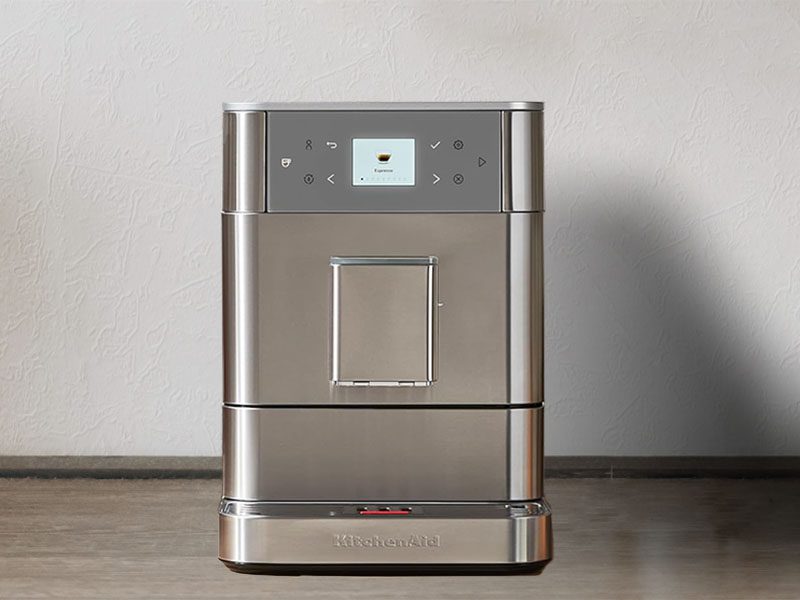 Front view of the KitchenAid KF6 turned on with 'Espresso' on the screen