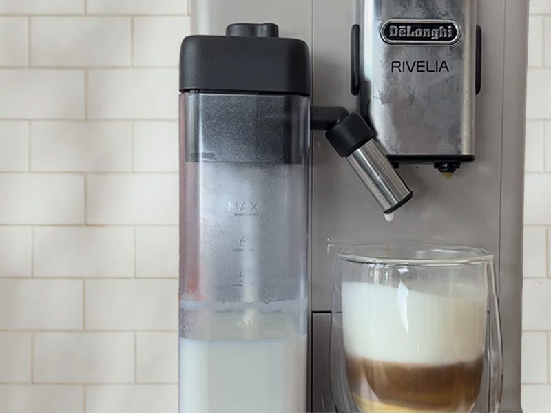 The DeLonghi Rivelia making a cappuccino