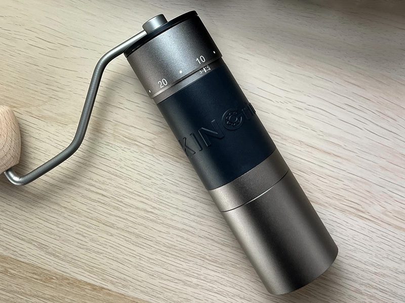Kingrinder K6 manual coffee grinder lying flat on table
